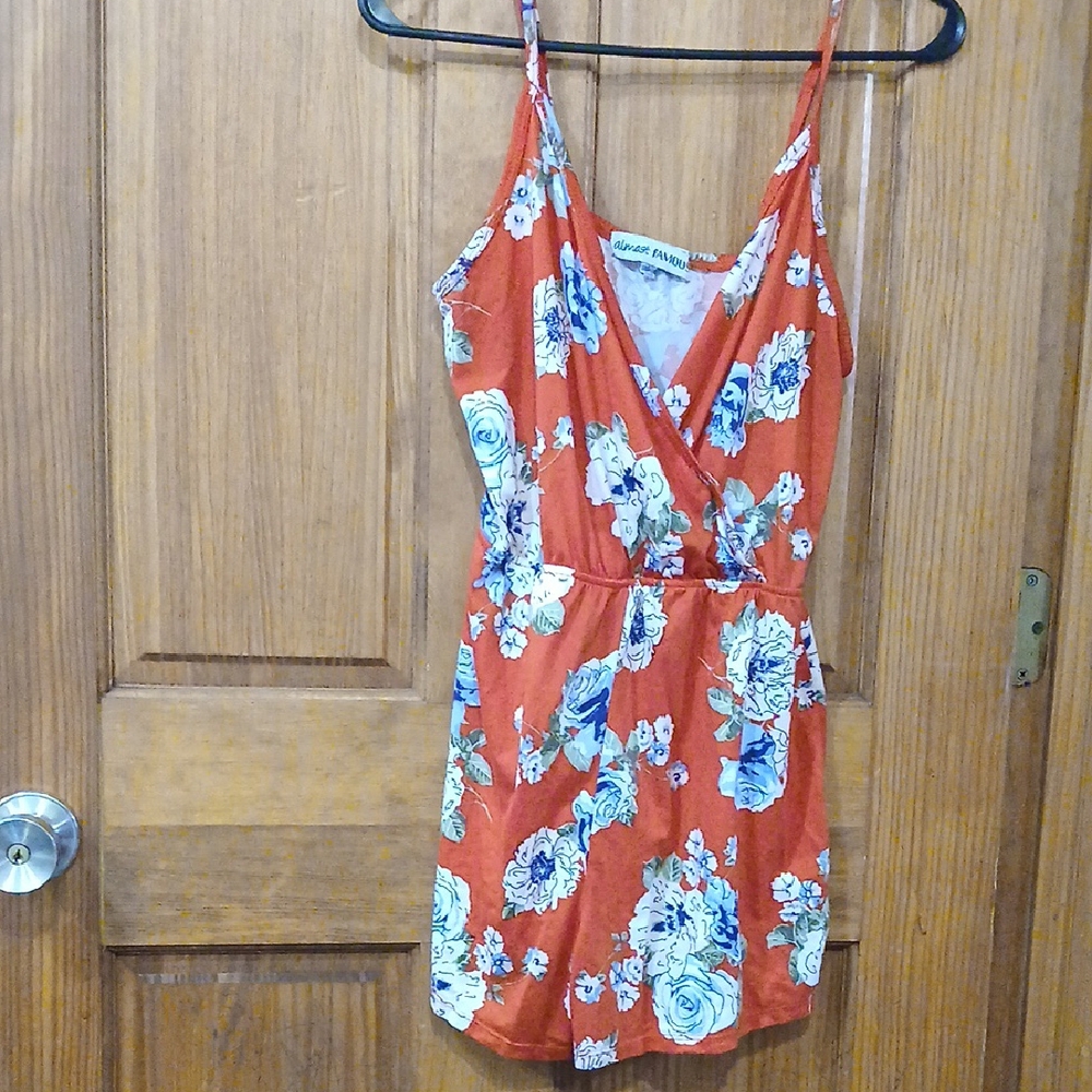 Almost Famous Floral Jumpsuit in Orange and Blue